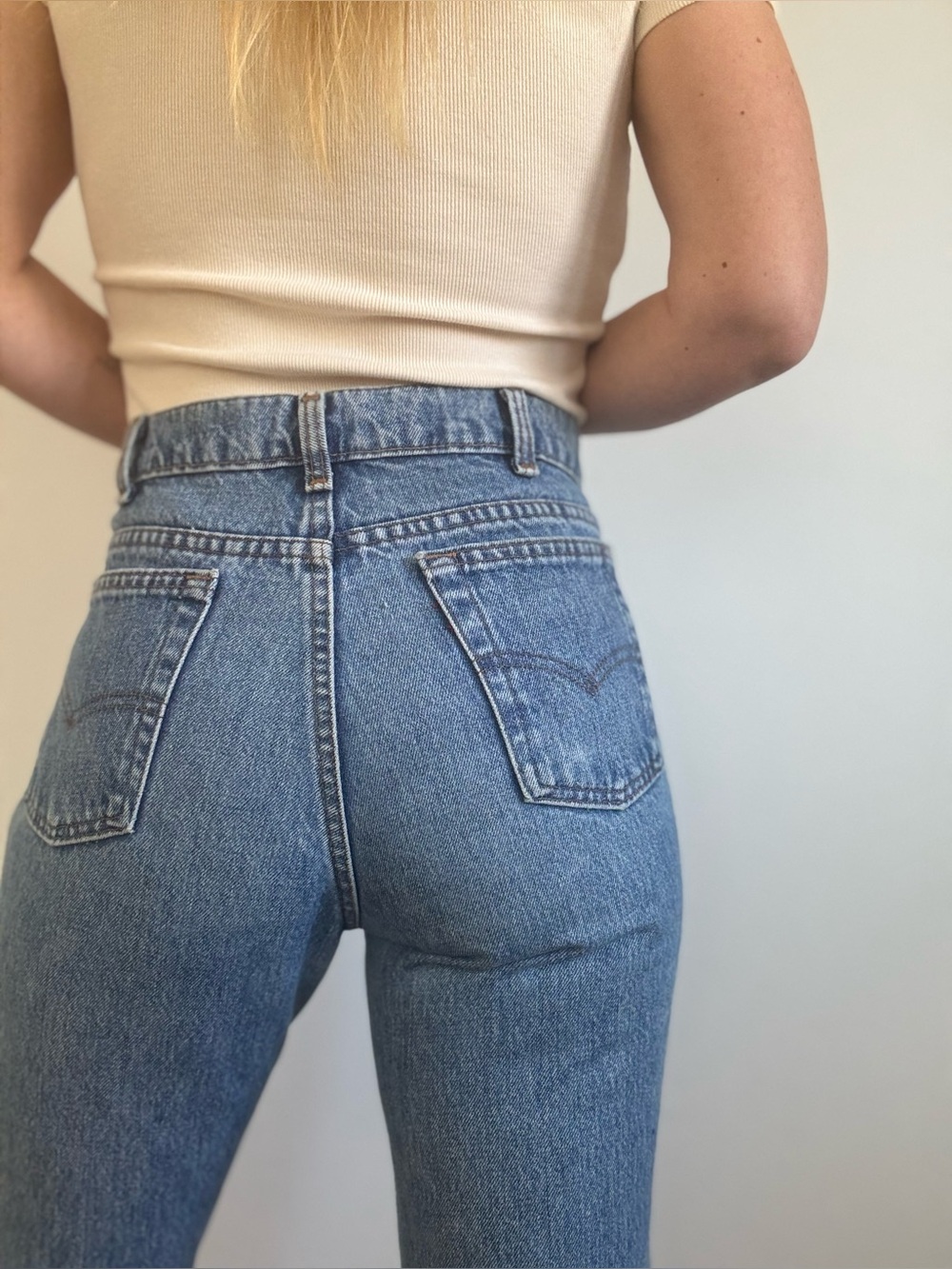 Vintage Levi’s 531 mid blue straight leg 90s raw hem high rise